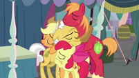 Apple siblings hugging their grandfather S7E13