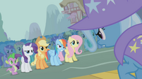 Rainbow Dash, looks ready to put Trixie in her place.