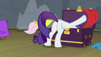 Rarity looks through trunk of fabrics S8E7