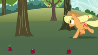 Applejack running toward another apple tree S7E9