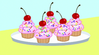 Cookbook drawing of delicious cupcakes S8E18