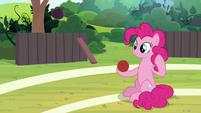 Pinkie Pie holding a buckball S9E15