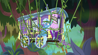 Starlight, Trixie, and wagon tangled in vines S8E19