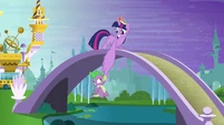 Twilight catches Spike with her wing S4E01