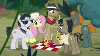 Fluttershy shares food with Caballeron's team S9E21