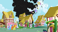 Derpy and other pegasi clearing the dragon's smoke.
