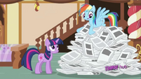 Rainbow Dash searching through paper pile S2E23