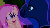 Twilight holds Fluttershy in front of Princess Luna S2E04