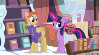 Twilight takes journal copy out of her bag S7E14
