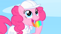 Pinkie dips her hoof into a pool and tastes it.