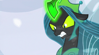 Queen Chrysalis baring her fangs at Starlight S9E24