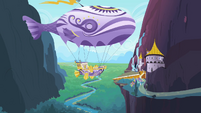 Rarity sends off a flying airship off a cliff in Canterlot.