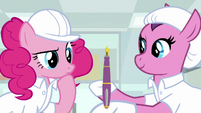 Factory mare shows ink pen to Pinkie S9E14