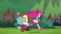 Pinkie Pie speeding past Applejack CYOE15b