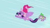 Twilight flying with Pinkie Pie on her back S5E12