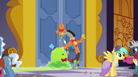 Discord pushes the Smooze toward the front door S5E7
