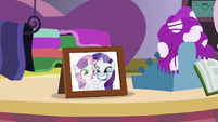 Photo of Rarity and Sweetie Belle on Rarity's workbench S7E6