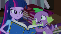 Spike gives the yearbook to Twilight EG