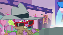 Spike looking embarrassed at tourists S8E11