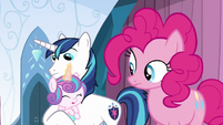 Pinkie looks at Flurry Heart using her magic S6E2