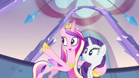 Princess Cadance pointing out the mud bath.