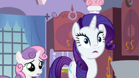 Rarity is caught off guard by Sweetie Belle.