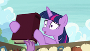 Twilight grabs library book in a panic S9E5