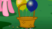 Pinkie's brought a basket with lots of balloons.