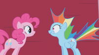 Pinkie Pie scares Rainbow Dash.