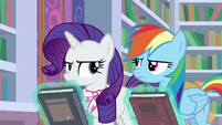 Rarity and Rainbow glare at each other S8E17