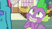 Spike grinning nervously and covered in sweat S7E15