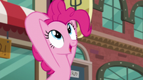 Pinkie trying to grab something inside her mane S6E3