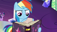 Rainbow Dash flips through more pages S7E14