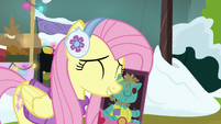 Fluttershy nuzzles Holly the Hearth's Warmer MLPBGE