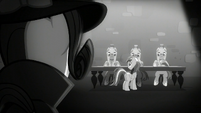 Rarity looks at Rainbow and the castle guards S5E15
