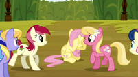 Rose moves to reveal a hiding Fluttershy.