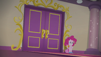Pinkie Pie sits outside buffet room EGSB