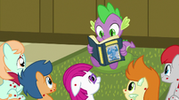Spike reading to the sick foals S7E3
