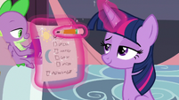 Twilight Sparkle checking a checklist S9E17