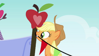 Applejack tying a rope on a nail S3E08