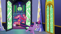 Twilight excitedly gallops out of the castle library S6E19
