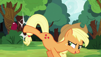 Applejack kicks another apple at the target S6E18