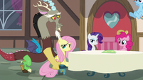 Discord pushing Fluttershy's chair S5E22