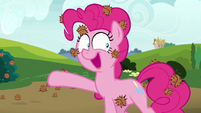 Pinkie Pie pointing off-screen at Tank S7E4
