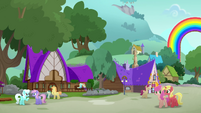 Ponies by cottages with purple roofs MLPRR