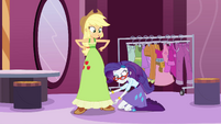 Rarity begins to shorten Applejack's dress EG