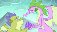 Spike's mother giving his egg to Sludge S8E24