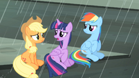 Twilight, Rainbow and Applejack sitting on the street S4E08