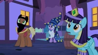Several ponies see the terrifying Nightmare Moon in her chariot.