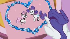 Rarity looking at Sweetie Belle's drawing S02E05